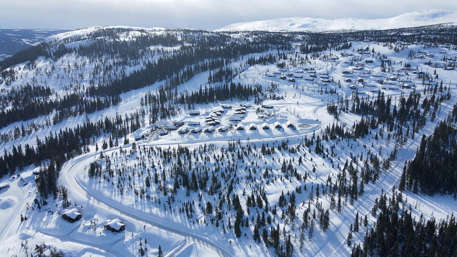 Hyttefelt i vinterlandskap